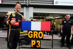 Romain Grosjean, Lotus F1 Team celebrates his third position with the team