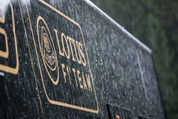 Lotus F1 Team truck and logo in a post race rain storm