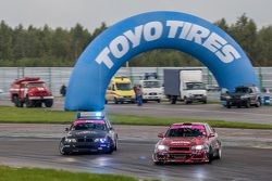 Аркадий Пучинин, BMW, и Николай Тигаев, Nissan