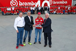 Sebastian Vettel and Maurizio Arrivabene, Ferrari Team Principal at Brembo factory