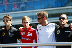 Romain Grosjean, Lotus F1 Team with Sebastian Vettel, Ferrari, Jenson Button, McLaren and Pastor Mal