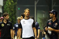 Jenson Button, McLaren with Daniel Ricciardo, Red Bull Racing
