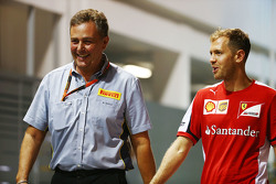 Mario Isola, Pirelli Racing Manager with Sebastian Vettel, Ferrari