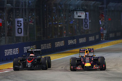 Jenson Button, McLaren MP4-30 and Daniil Kvyat, Red Bull Racing RB11