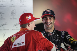 Kimi Raikkonen, Ferrari and Daniel Ricciardo, Red Bull Racing on the podium
