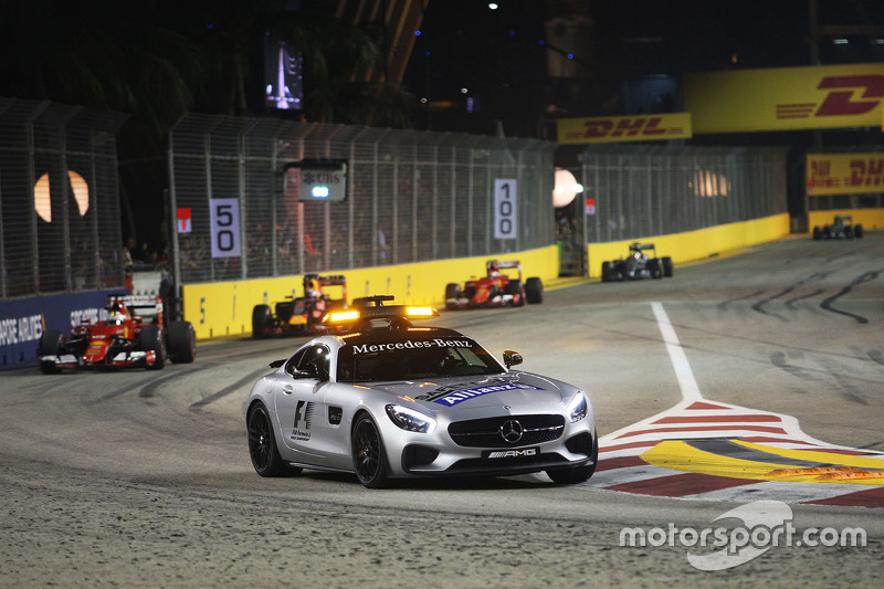 Sebastian Vettel, Ferrari SF15-T leads behind the FIA Safety Car