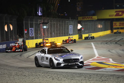Sebastian Vettel, Ferrari SF15-T leads behind the FIA Safety Car