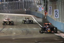 Max Verstappen, Scuderia Toro Rosso STR10 leads Romain Grosjean, Lotus F1 E23 and Sergio Perez, Saha