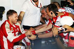 Race winner Sebastian Vettel, Ferrari celebrates with Maurizio Arrivabene, Ferrari Team Principal in