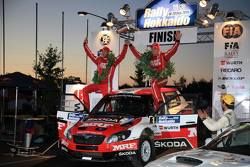 Winner: Pontus Tidemand and Emil Axelsson, Skoda Fabia S2000, Team MRF celebrate their victory