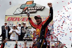 Victory lane: race winner Martin Truex Jr. celebrates