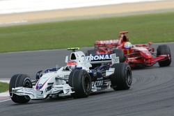 Robert Kubica, BMW Sauber F1 Team, F1.07 and Felipe Massa, Scuderia Ferrari, F2007