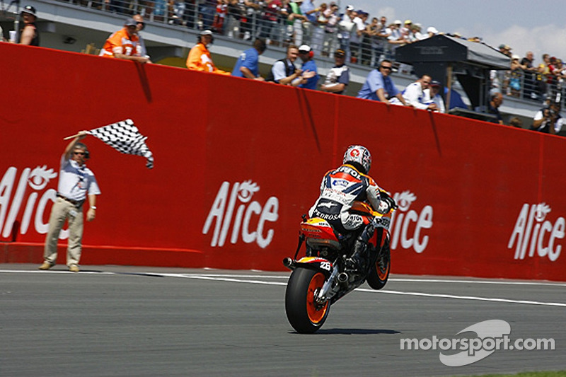 Dani Pedrosa takes the checkered flag