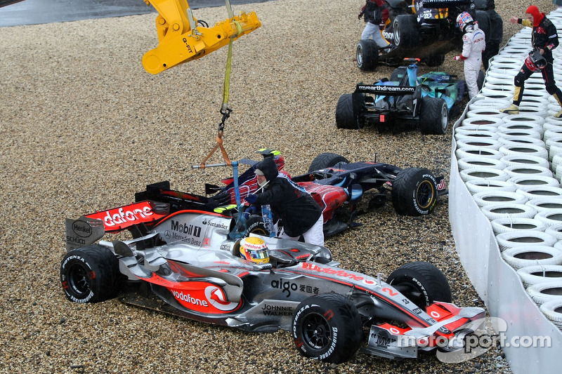Lewis Hamilton, McLaren Mercedes, MP4-22 is lifted back onto the circuit