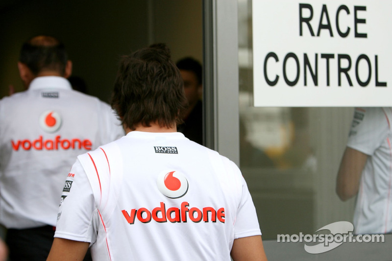 Fernando Alonso, McLaren Mercedes and Ron Dennis, McLaren, Team Principal, Chairman at Race Control