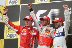 Podium: race winner Lewis Hamilton with second place Kimi Raikkonen and third place Nick Heidfeld