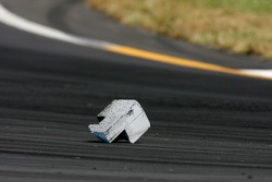 A debri on the track causes a yellow flag