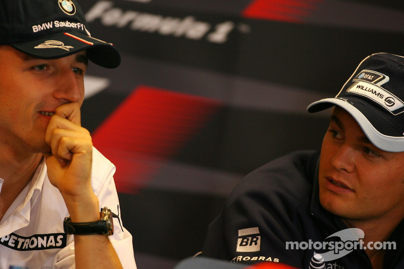 Robert Kubica, BMW Sauber F1 Team, Nico Rosberg, WilliamsF1 Team
