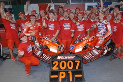 Celebrations at Ducati: 2007 MotoGP champion Casey Stoner and race winner Loris Capirossi celebrate with their team