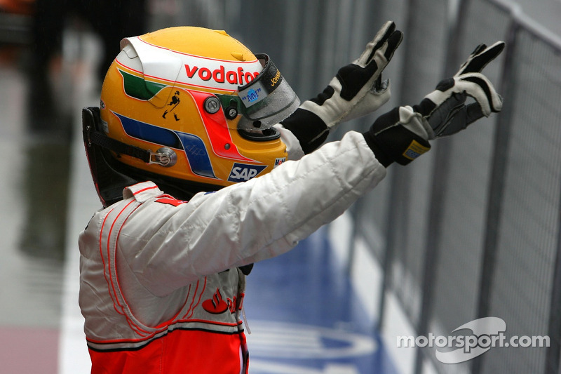 Race winner Lewis Hamilton celebrates