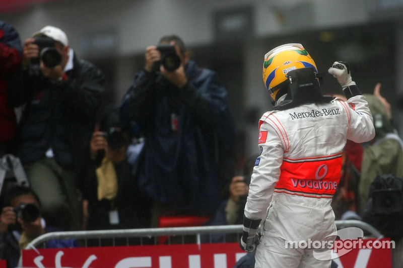 Race winner Lewis Hamilton celebrates