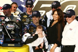 Victory lane: race winner Jeff Gordon celebrates with his baby girl Ella, wife Ingrid and Rick Hendrick