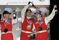 GT1 podium: champagne for Didier Theys, Fredy Lienhard and Andrea Bertolini