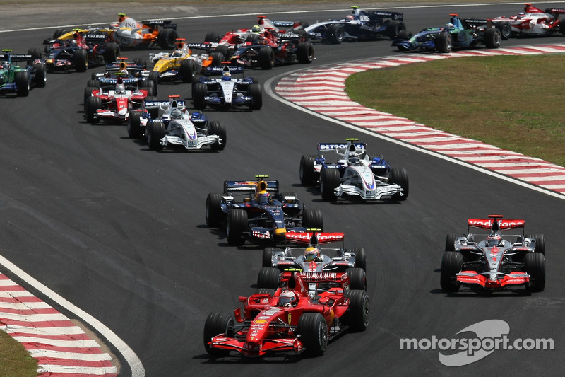 Salida: Felipe Massa, Scuderia Ferrari, F2007, Kimi Raikkonen, Scuderia Ferrari, F2007 y Lewis Hamil