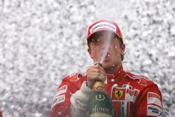 Podium: champagne for Kimi Raikkonen