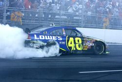 Race winner Jimmie Johnson celebrates