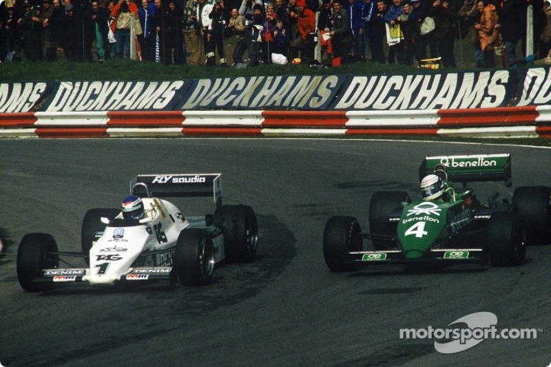 Keke Rosberg, Williams-Cosworth FW08C battles with Danny Sullivan