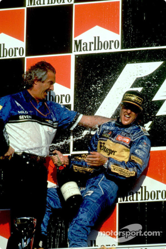 Podium: race winner and 1995 Formula One World Champion Michael Schumacher celebrates