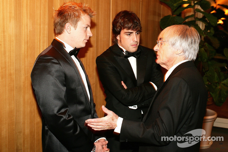 Formula One drivers Kimi Raikkonen and Fernando Alonso with FOM President Bernis Ecclestone