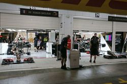 The Lotus F1 Team pit garages at night