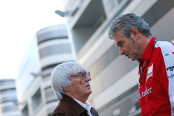 (L to R): Bernie Ecclestone, with Maurizio Arrivabene, Ferrari Team Principal
