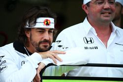 (L to R): Fernando Alonso, McLaren celebrates his 250th GP with Eric Boullier, McLaren Racing Director