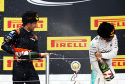 (L to R): Sergio Perez, Sahara Force India F1 celebrates his third position on the podium with race winner Lewis Hamilton, Mercedes AMG F1