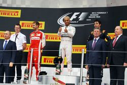 Het podium,: Sebastian Vettel, Ferrari, 2de; Lewis Hamilton, Mercedes AMG F1, winnaar; Sergio Perez, Sahara Force India F1, 3de