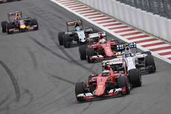 Kimi Raikkonen, Ferrari and Valtteri Bottas, Williams and Sebastian Vettel, Ferrari