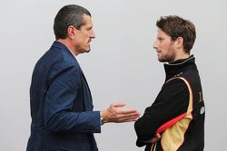 (L to R): Guenther Steiner, Haas F1 Team Principal with Romain Grosjean, Lotus F1 Team