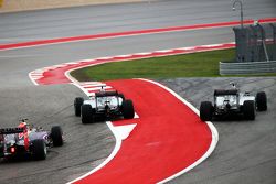 Nico Rosberg, Mercedes and Lewis Hamilton, Mercedes make contact in turn one