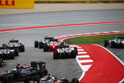 Lewis Hamilton, Mercedes AMG F1 W06 leads at the start of the race as Nico Rosberg, Mercedes AMG F1 W06 runs wide and Fernando Alonso, McLaren MP4-30 spins