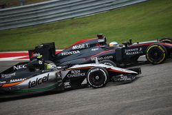 Fernando Alonso, McLaren MP4-30 and Sergio Perez, Sahara Force India F1 VJM08 battle for position