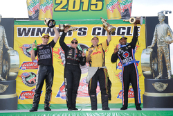 Race winners Andrew Hines, Erica Enders-Stevens, Clay Millican and Antron Brown