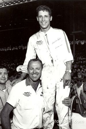 Mario Andretti celebrates second place in the Hoosier Hundred with Clint Brawner
