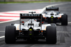 Nico Hulkenberg, Sahara Force India F1 VJM08 follows team mate Sergio Perez, Sahara Force India F1 VJM08 out of the pits