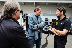 Gene Haas, Haas Automotion President with Guenther Steiner, Haas F1 Team Principal and Romain Grosjean, Lotus F1 Team