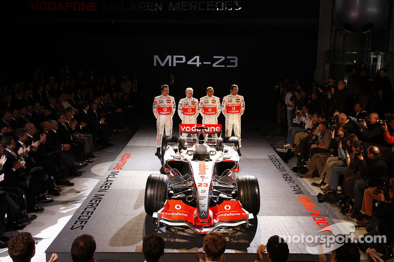 Gary Paffett, Heikki Kovalainen, Lewis Hamilton and Pedro de la Rosa pose with the new McLaren Mercedes MP4-23