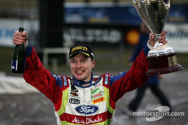 Podium: winner Jari-Matti Latvala celebrates