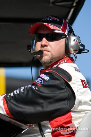 Mike Kelley, Crew Chief for David Ragan, watches his car through the frontstretch